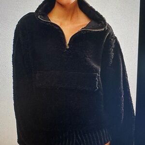 NWOT XSmall Free People Monarch Black Fleece with embossed logo and ruffles